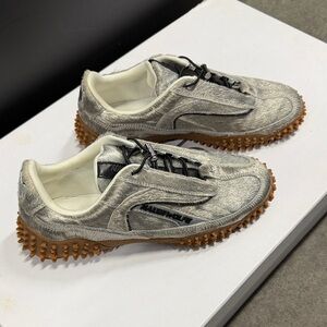 Island Silver Pony Hair sneaker by the brand Naked Wolfe.